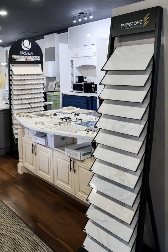Cabinet door sample tower beside a light countertop display