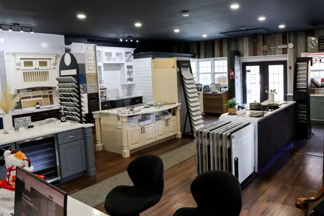 Showroom overview from behind a dark cabinet display