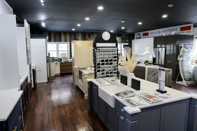 Wide aisle view of multiple kitchen and cabinet displays