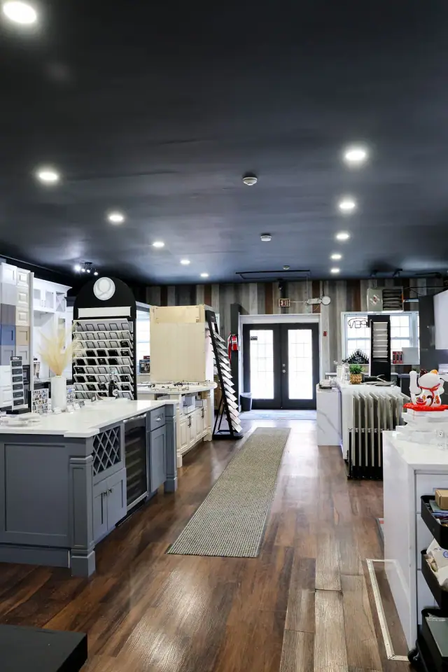 Deep showroom view with islands aligned along the aisle