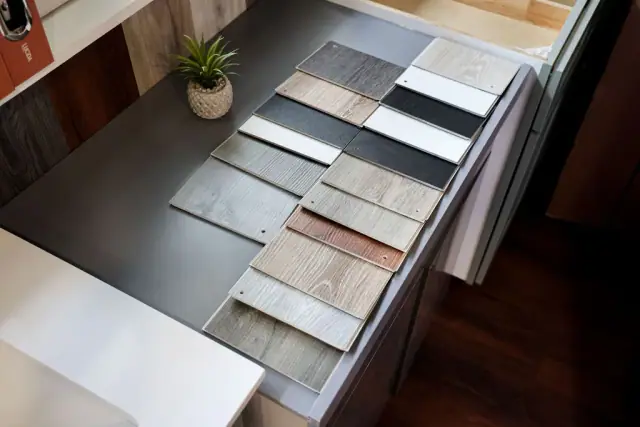 Long drawer displaying coordinated cabinet finish samples