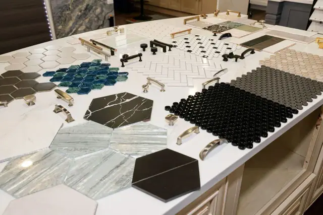 Hexagonal blue, white, and gray tile sample arrangement