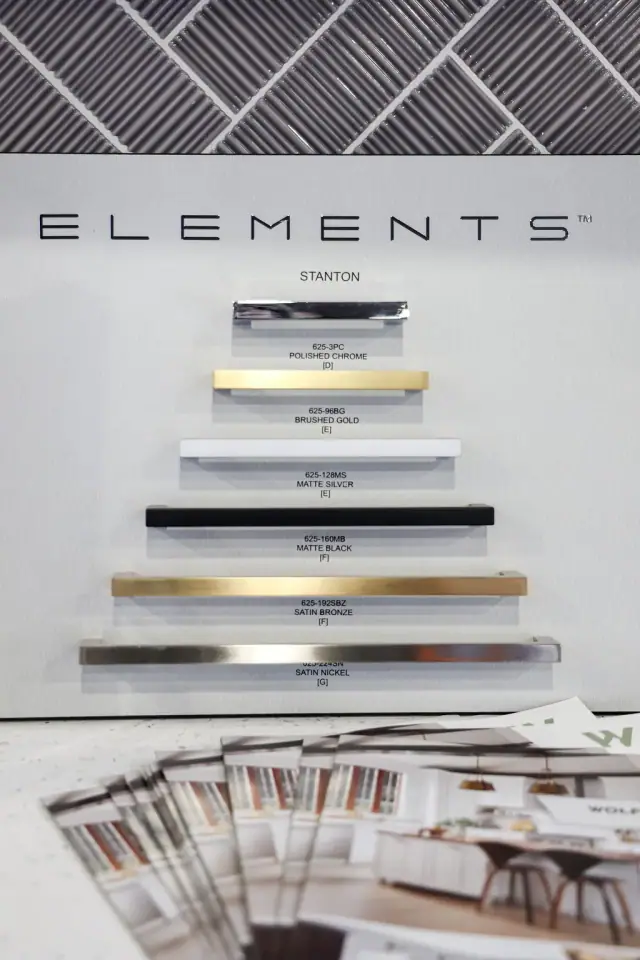 Element-branded wall display of cabinet hardware pulls