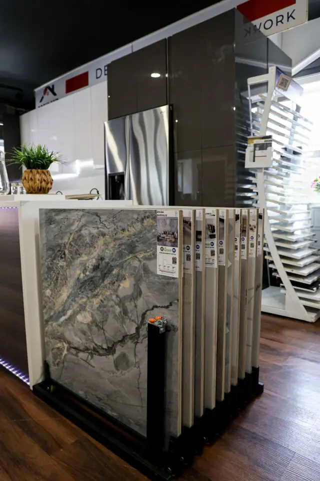 Large stone slab samples stored in a vertical rack