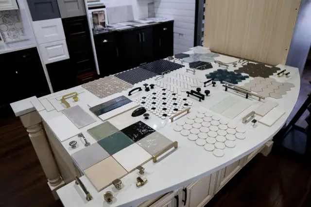 Close planning-table view of finish boards and handles