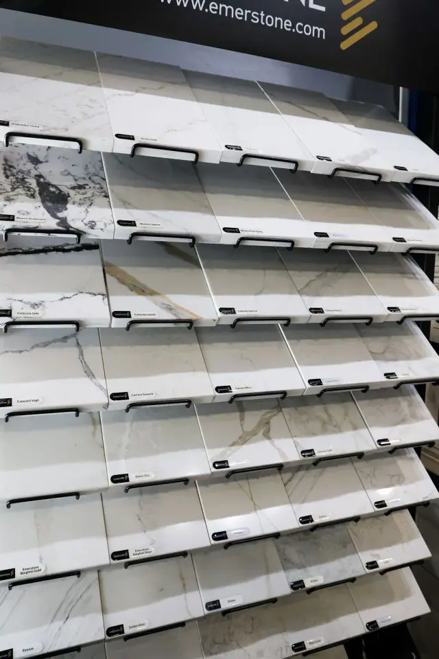 Wall rack displaying rows of narrow surface samples