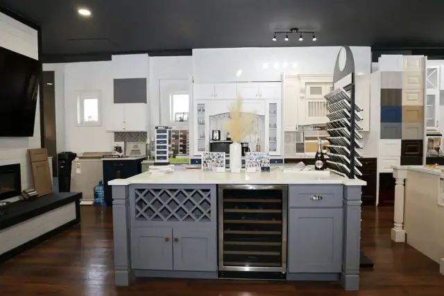 White island display with wine storage and dark drawer fronts