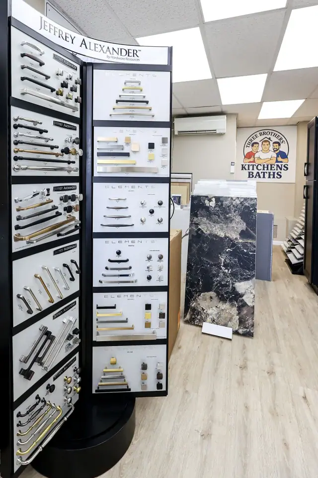 Showroom aisle between tall racks of finish sample boards