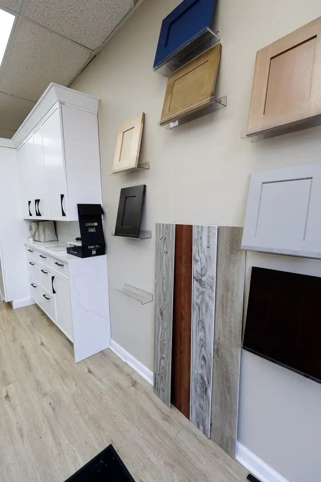 White material display with cabinet doors and sample panels